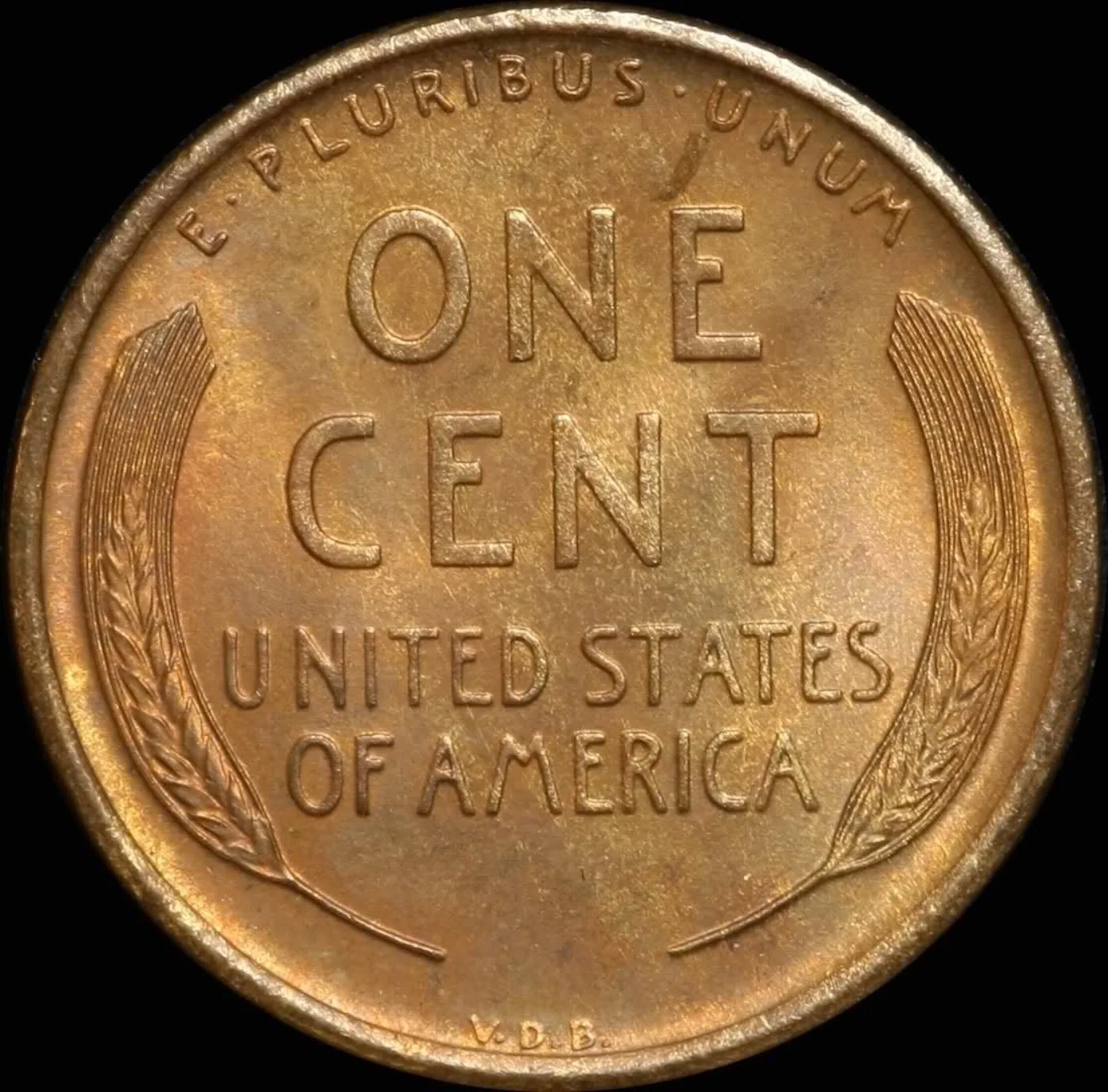 Reverse of a 1909-S VDB Lincoln cent with the V.D.B. initials clearly visible at the bottom rim between the wheat stalks