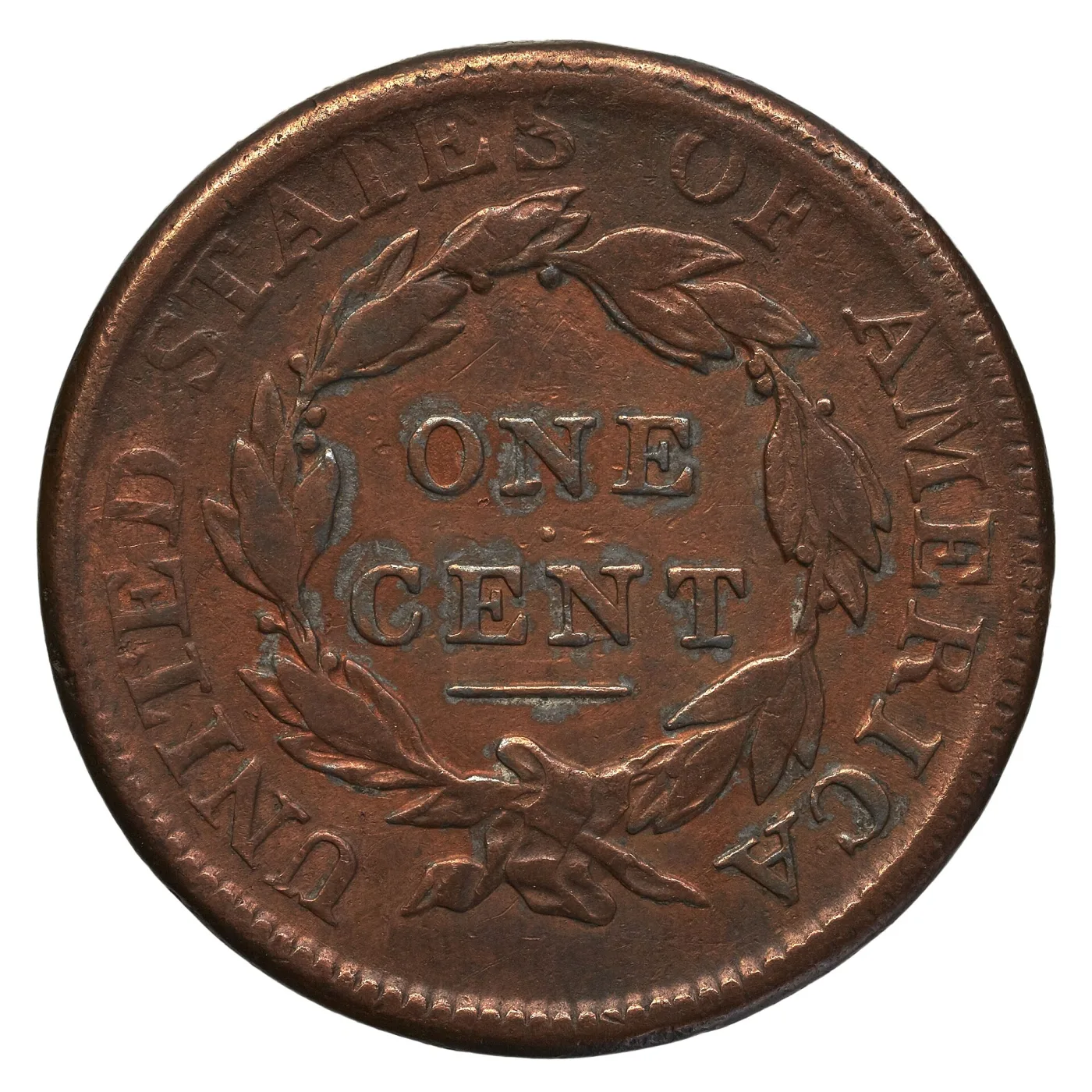 Reverse of a sharply struck 1812 Classic Head large cent with ONE CENT inside a laurel wreath and a completely blank field between the ribbon bow and the rim