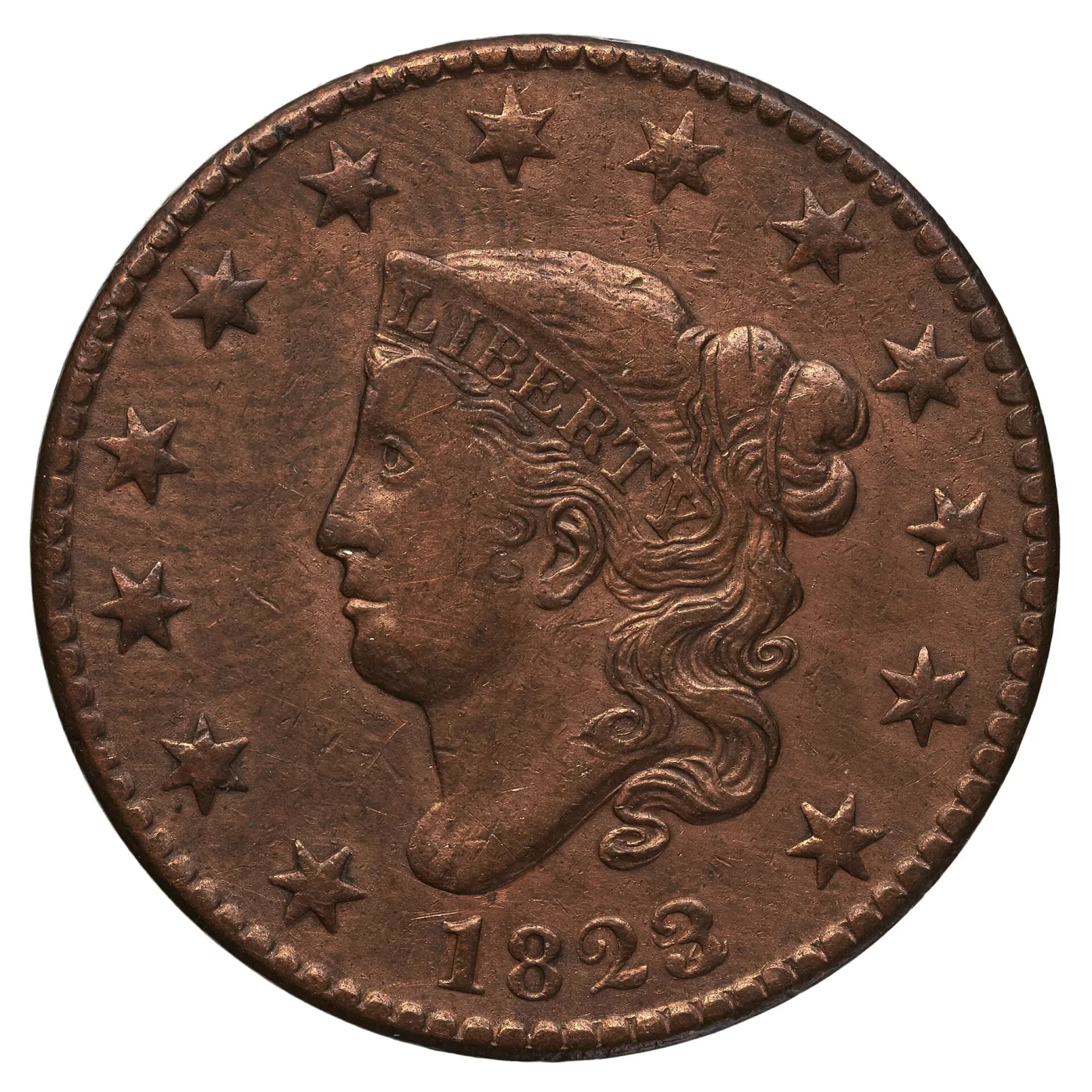 Obverse of an 1823 Coronet Head large cent, the key date, Liberty facing left in a coronet lettered LIBERTY with the date 1823 boldly struck below the bust
