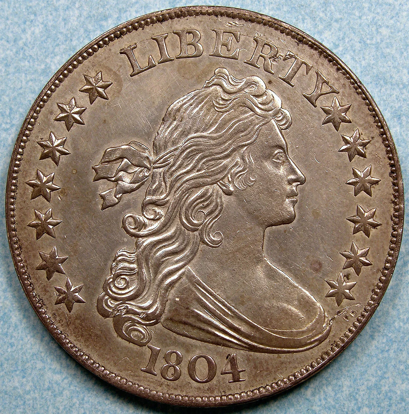 Obverse of a Class I 1804-dated Draped Bust dollar showing thirteen stars and the date 1804 in evenly spaced digits
