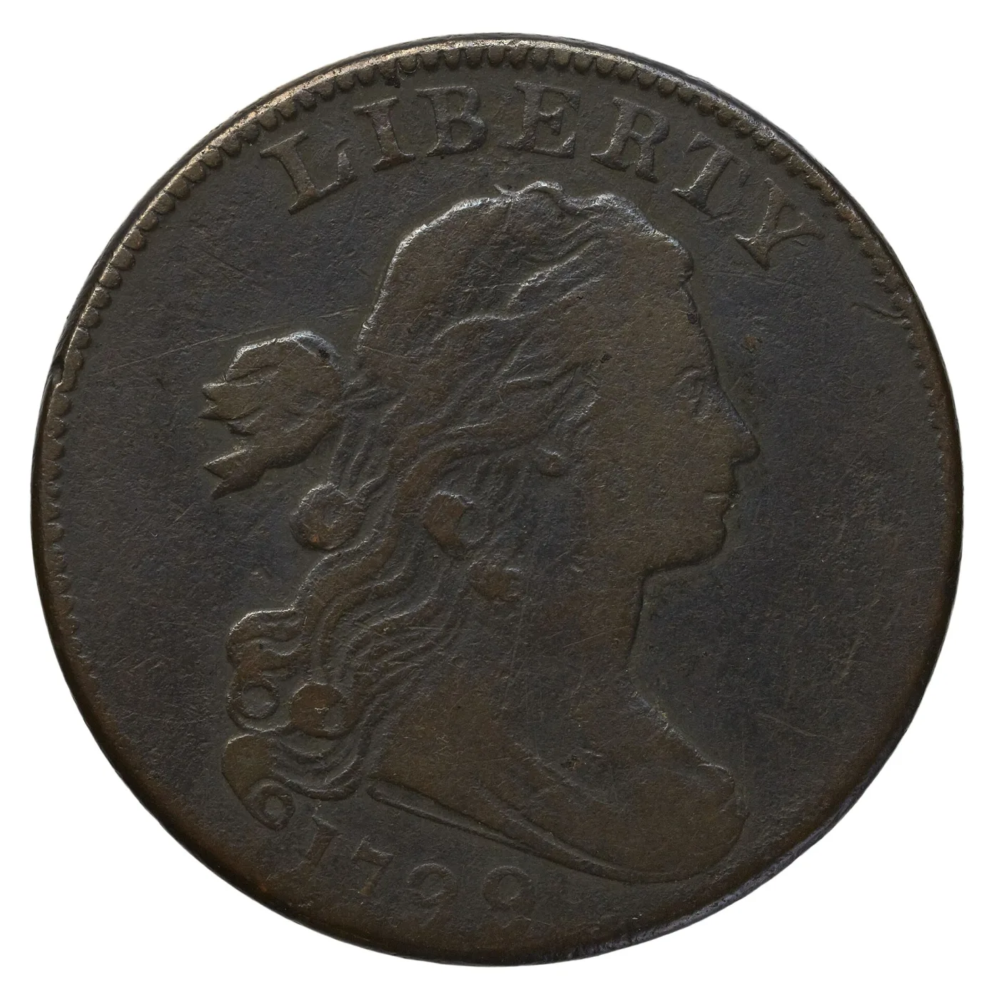 Obverse of a circulated dark brown 1799 Draped Bust large cent, LIBERTY complete above the portrait and the date legible below the bust