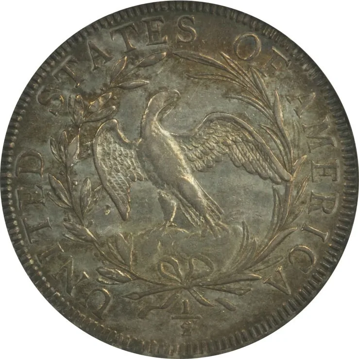 Reverse of a 1796 Draped Bust half dollar, small eagle inside an open wreath with the fraction one half below the wreath bow
