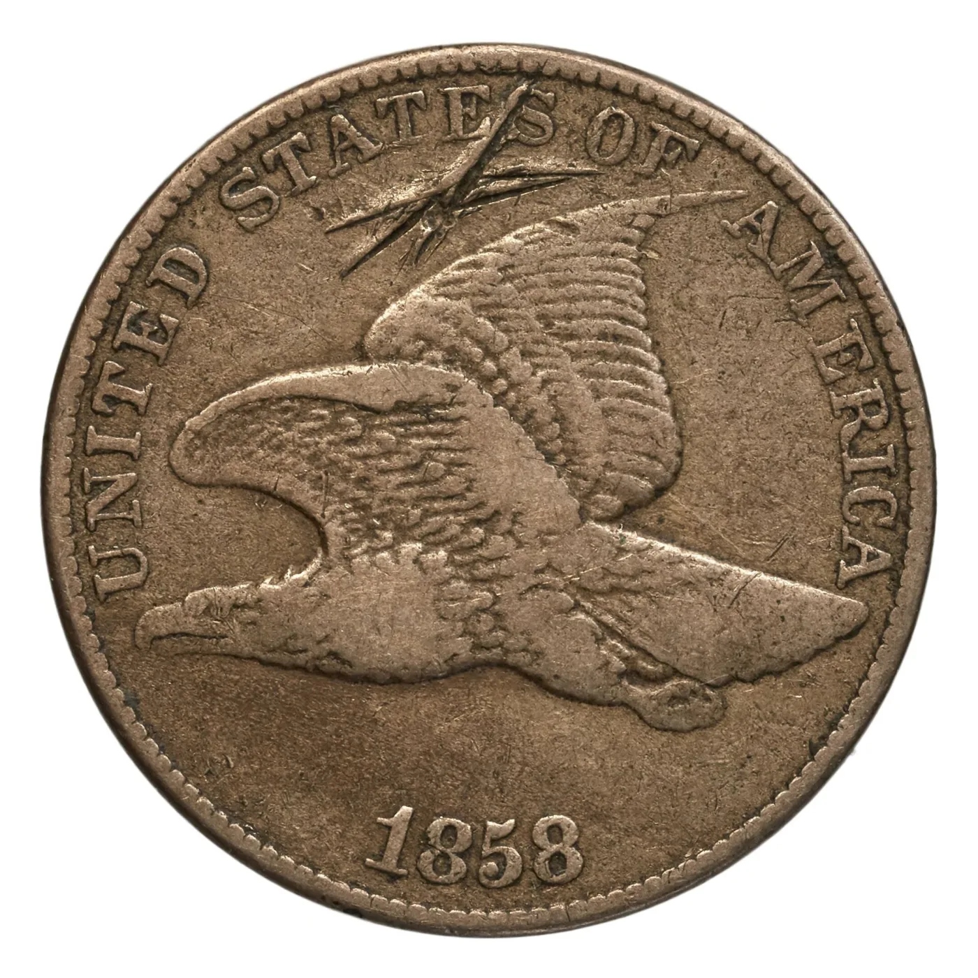 Obverse of an 1858 Flying Eagle cent showing UNITED STATES OF AMERICA around the rim and a scratch across the field above the eagle