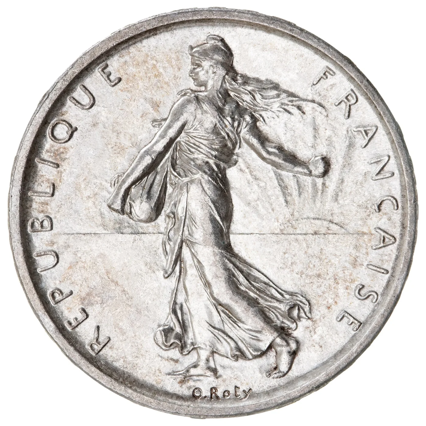 Obverse of a 1960 five-franc Semeuse showing a woman in a Phrygian cap striding left and scattering seed, with rays of a rising sun behind her