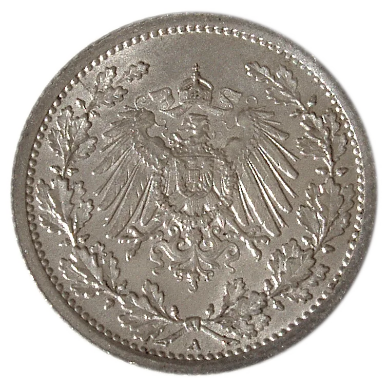 Side of a 1915 German Empire half mark showing a crowned imperial eagle with a shield on its breast inside an oak wreath, a small letter A at the bottom