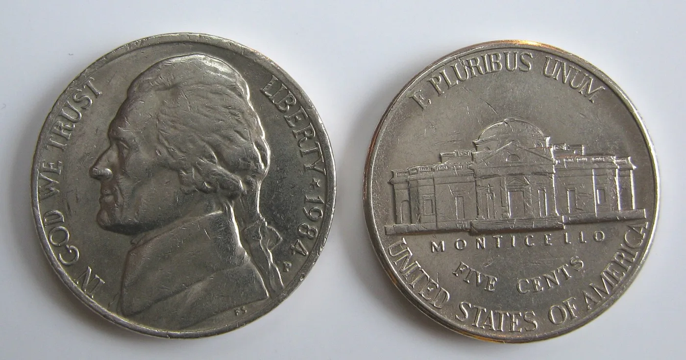 Obverse and reverse of a 1984-P Jefferson nickel, showing the left-facing Jefferson portrait with the P mint mark below the date and the Monticello reverse