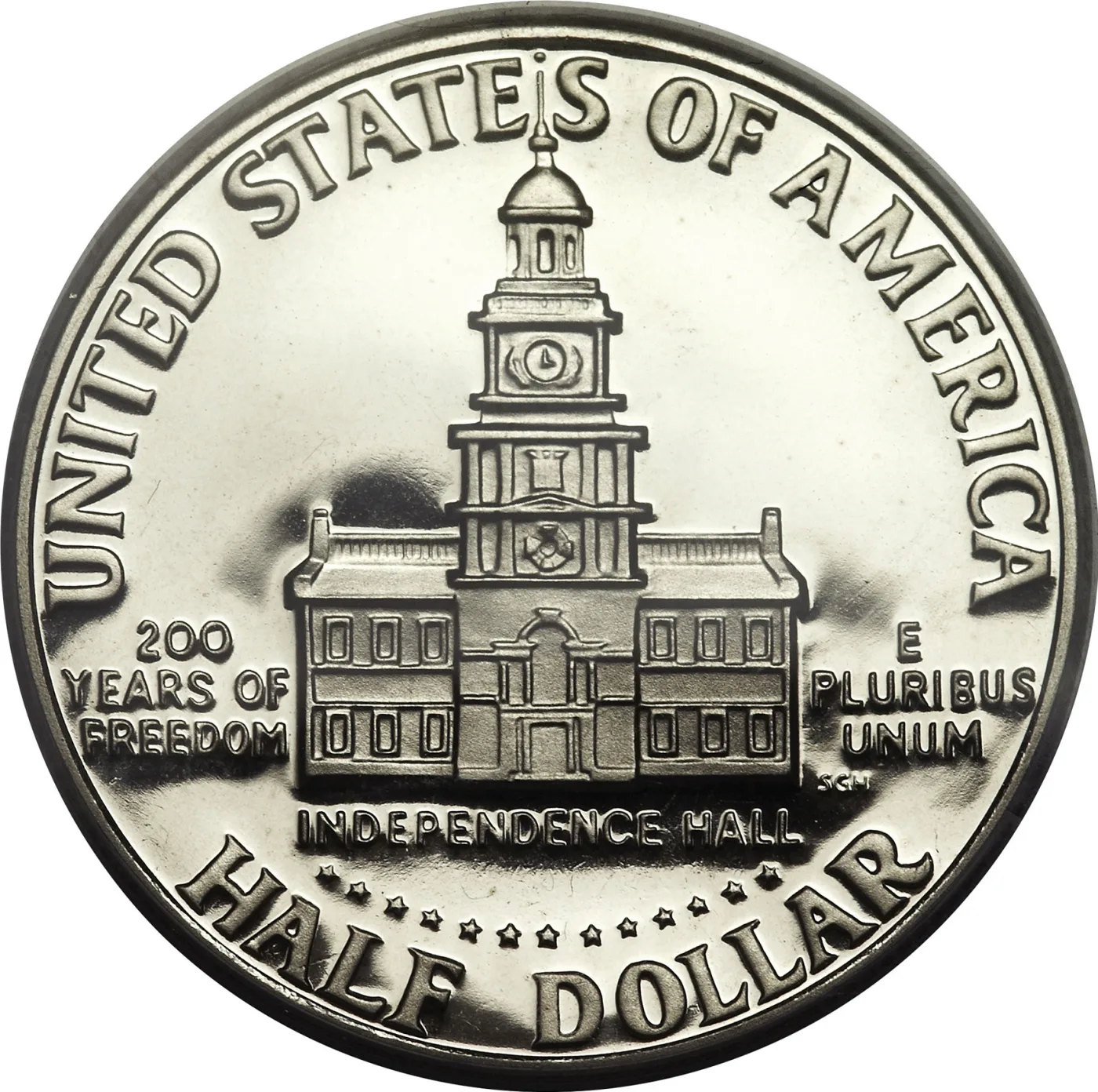 Reverse of a 1976-S clad proof Bicentennial Kennedy half dollar showing Independence Hall, INDEPENDENCE HALL below the building and 200 YEARS OF FREEDOM at the left