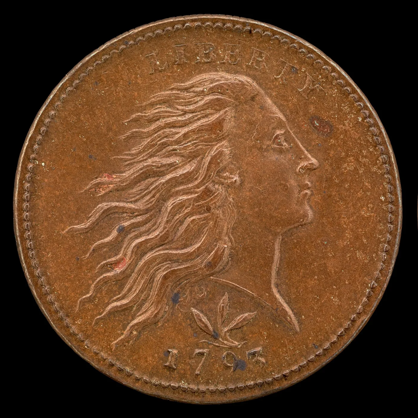 Obverse of a 1793 Wreath cent with flowing hair, a beaded border, and a sprig of three leaves above the date