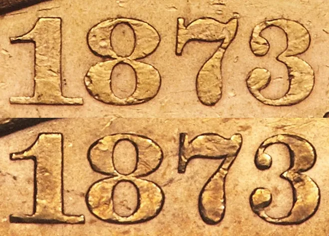 Two magnified 1873 dates stacked one above the other, the upper 3 with knobs curling almost closed and the lower 3 with clearly separated knobs