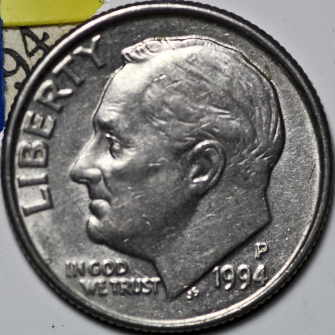 Obverse of a 1994-P Roosevelt dime with the P mint mark above the date