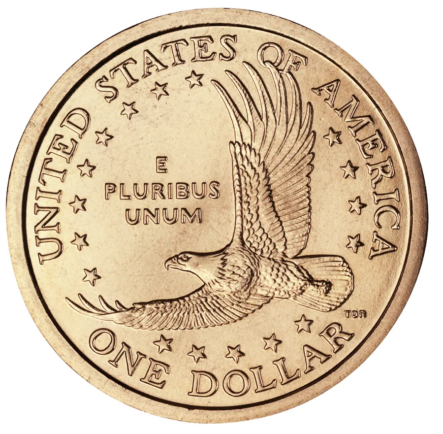 Reverse of a Sacagawea dollar, an eagle in flight with wings raised, ringed by seventeen stars, UNITED STATES OF AMERICA above and ONE DOLLAR below