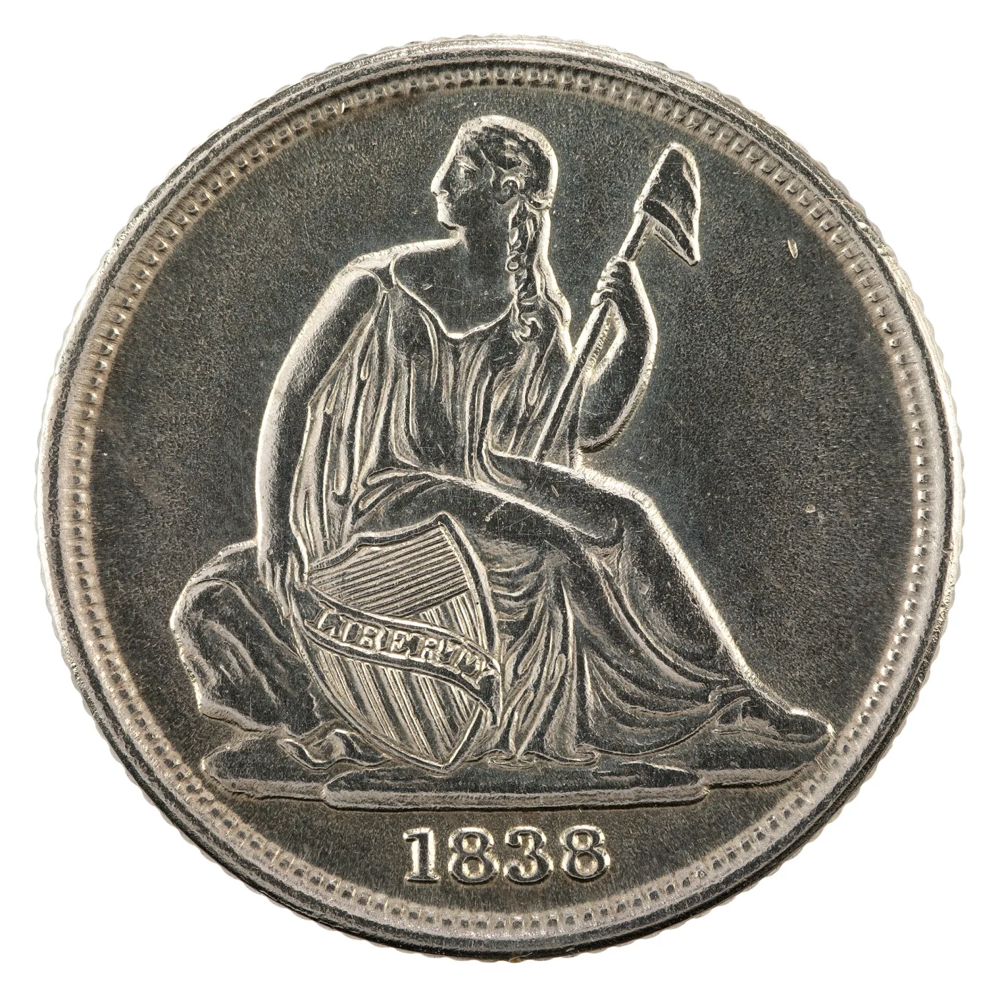 Obverse of an 1838-O Seated Liberty dime with a completely plain field around Liberty, no stars, and the date 1838 below the rock