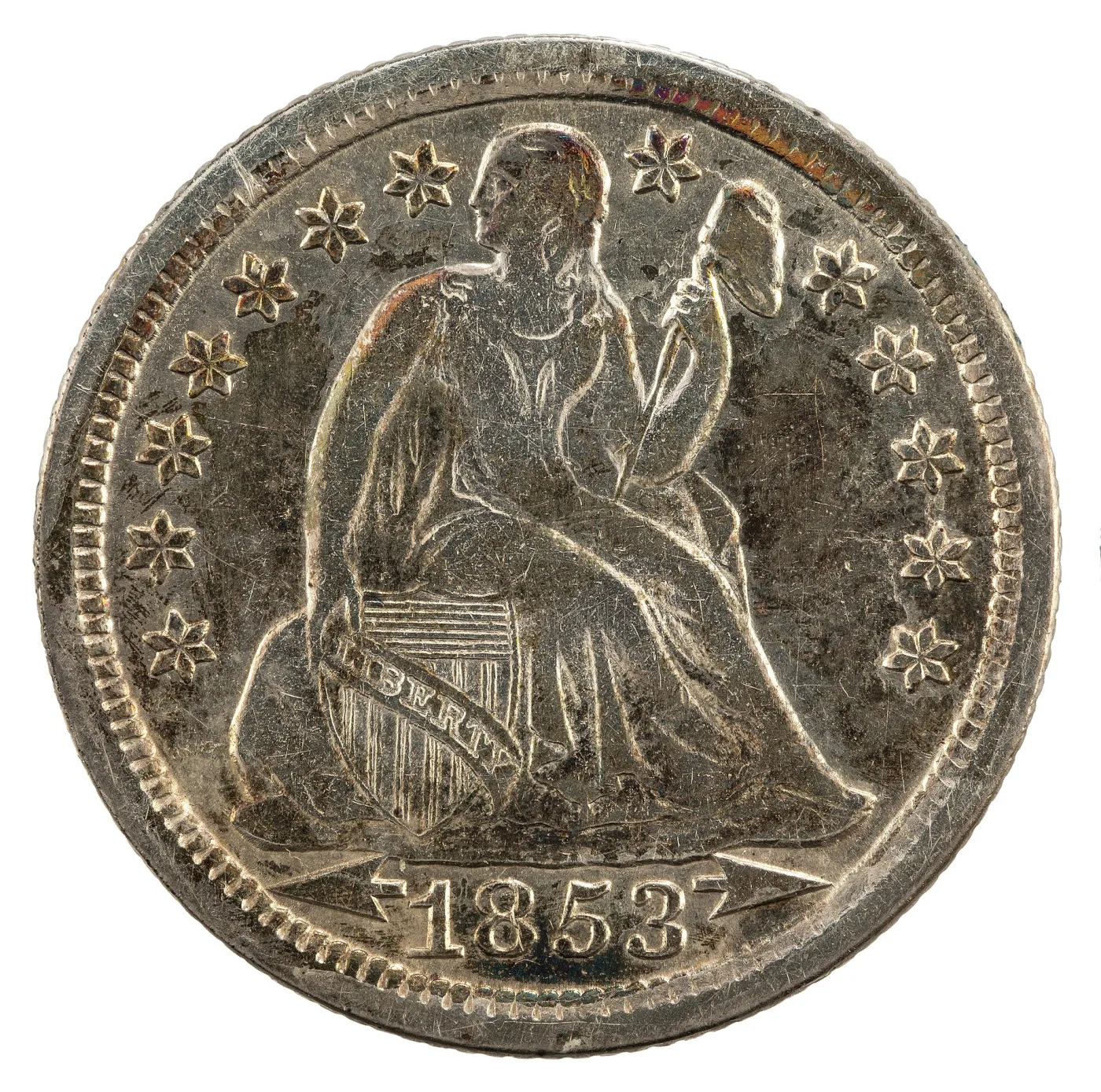 Obverse of an 1853 Seated Liberty dime with a small arrowhead on each side of the date 1853, each head pointing outward toward the rim