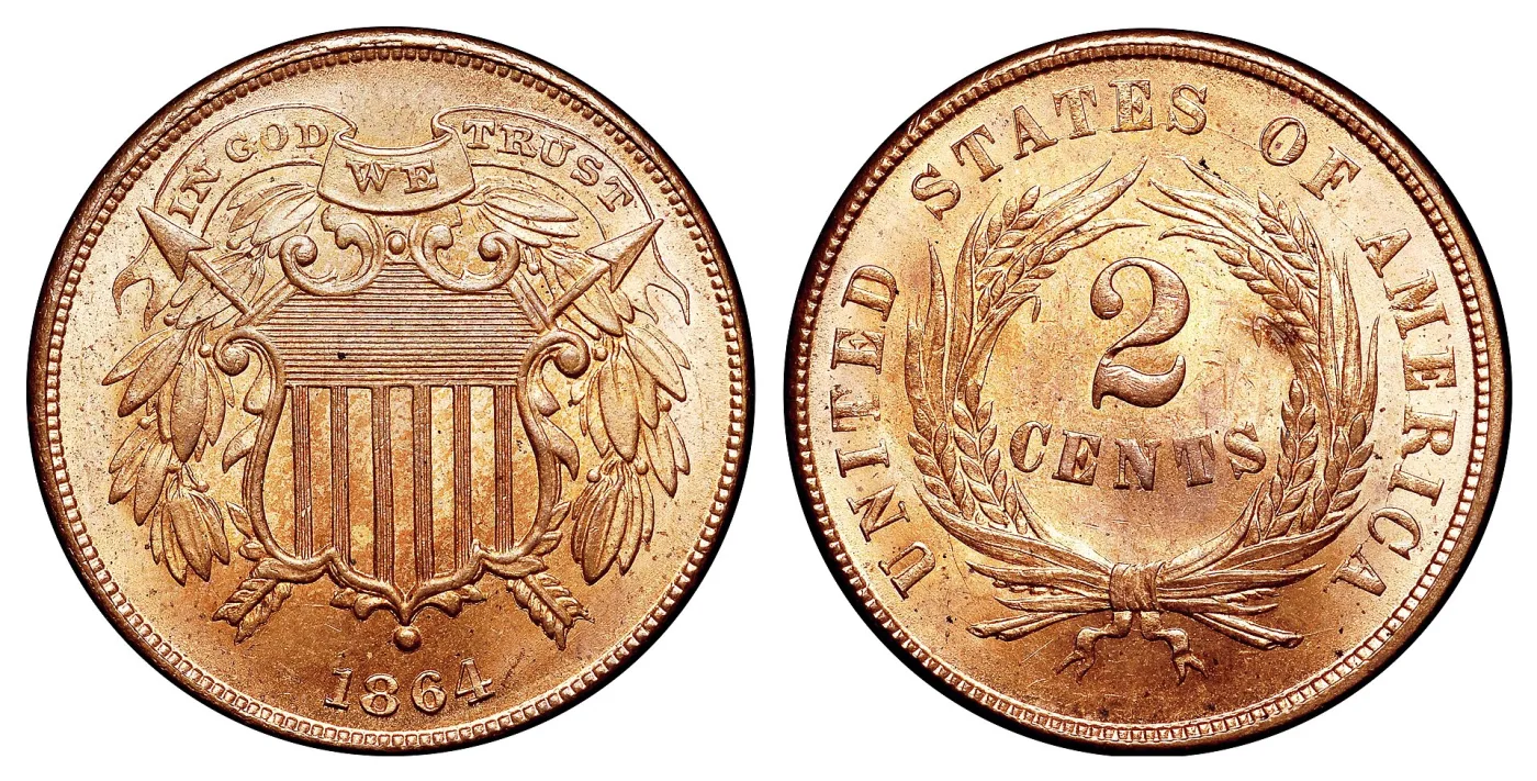 Obverse and reverse of an 1864 Small Motto two cent piece, showing the Union shield under the IN GOD WE TRUST banner and the 2 CENTS wheat wreath reverse